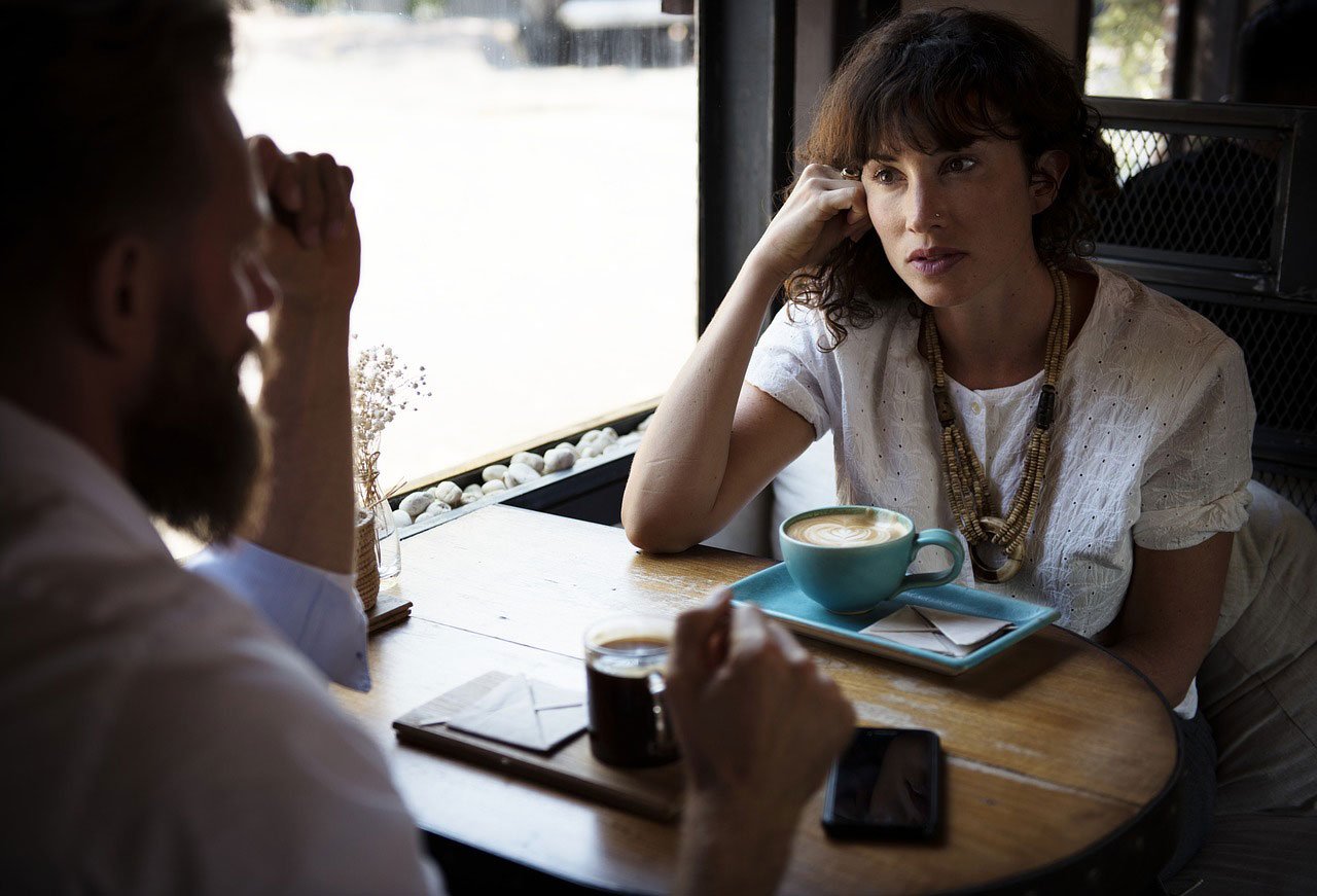 two people listening