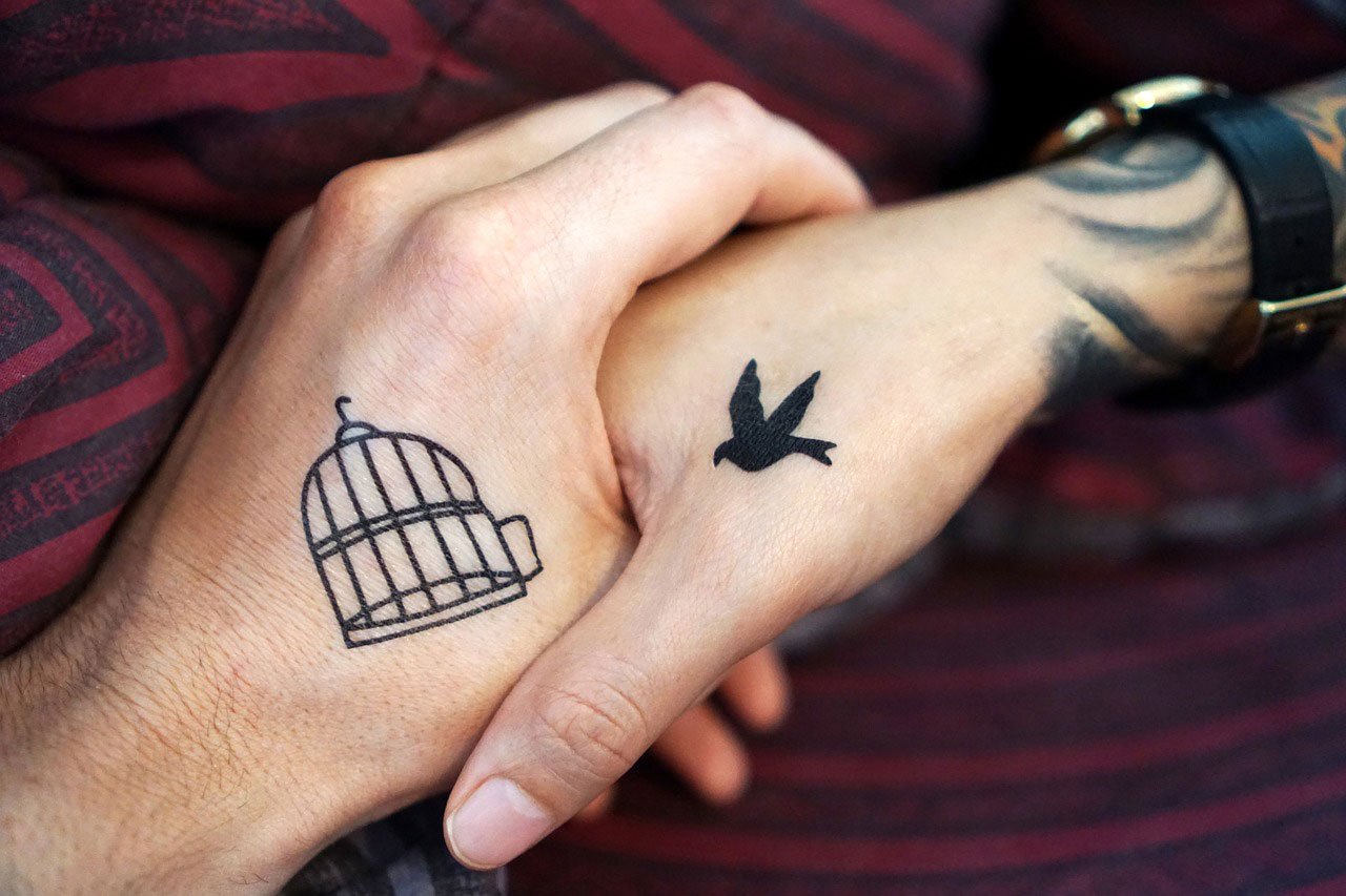 tatoo bird cage